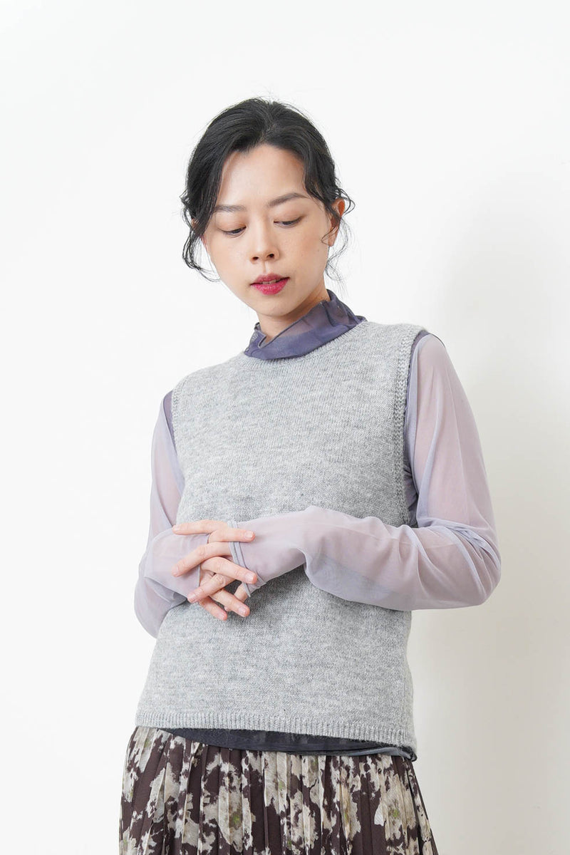 Ivory knit vest w/ strings back details