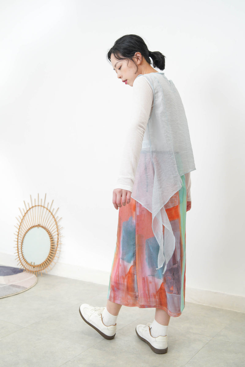 Baby blue sheer vest in asymmetrical cut