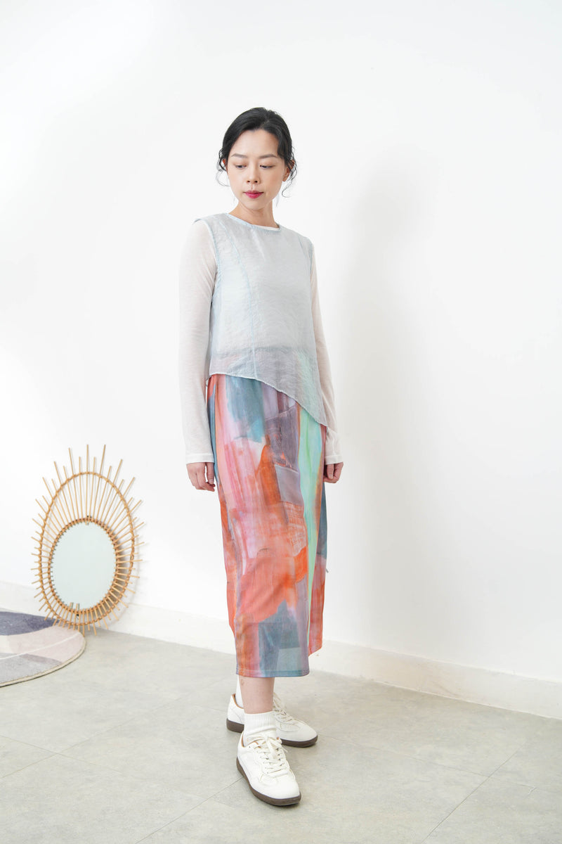 Baby blue sheer vest in asymmetrical cut