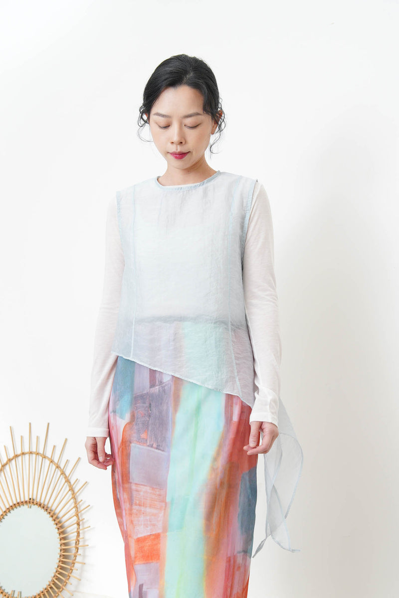 Baby blue sheer vest in asymmetrical cut