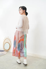 Pink sheer vest in asymmetrical cut