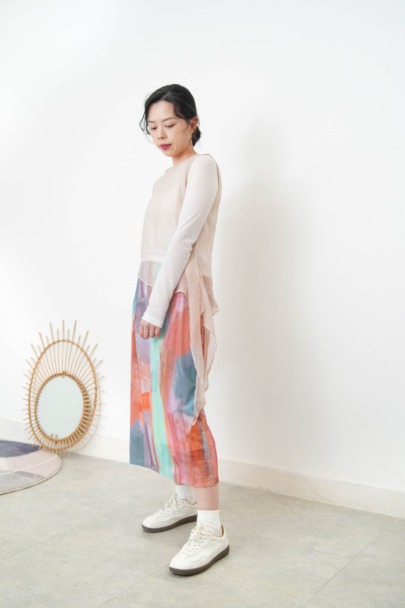Pink sheer vest in asymmetrical cut