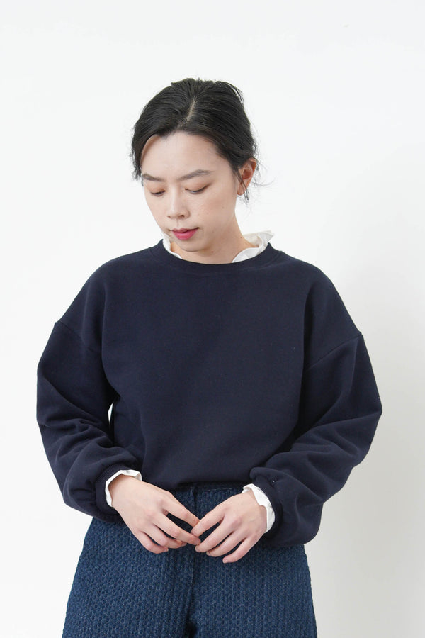 Navy pullover w/ white shirt layers