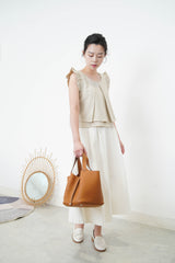 Beige double layers vest in ruffle shoulders