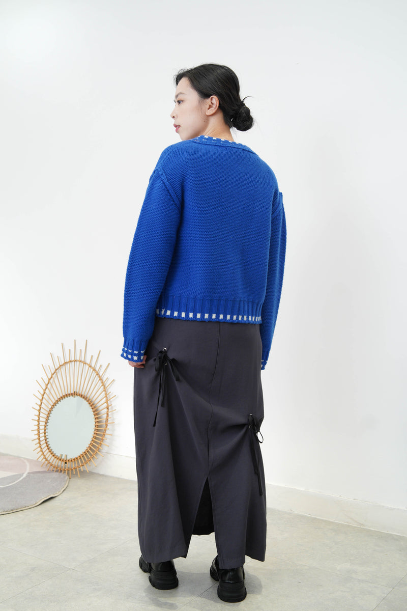 Cyan blue 100% wool cardigan in outline stitching