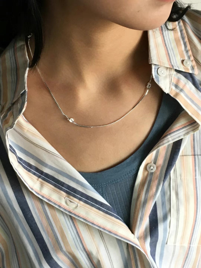 Premium silver necklace in minimal knots