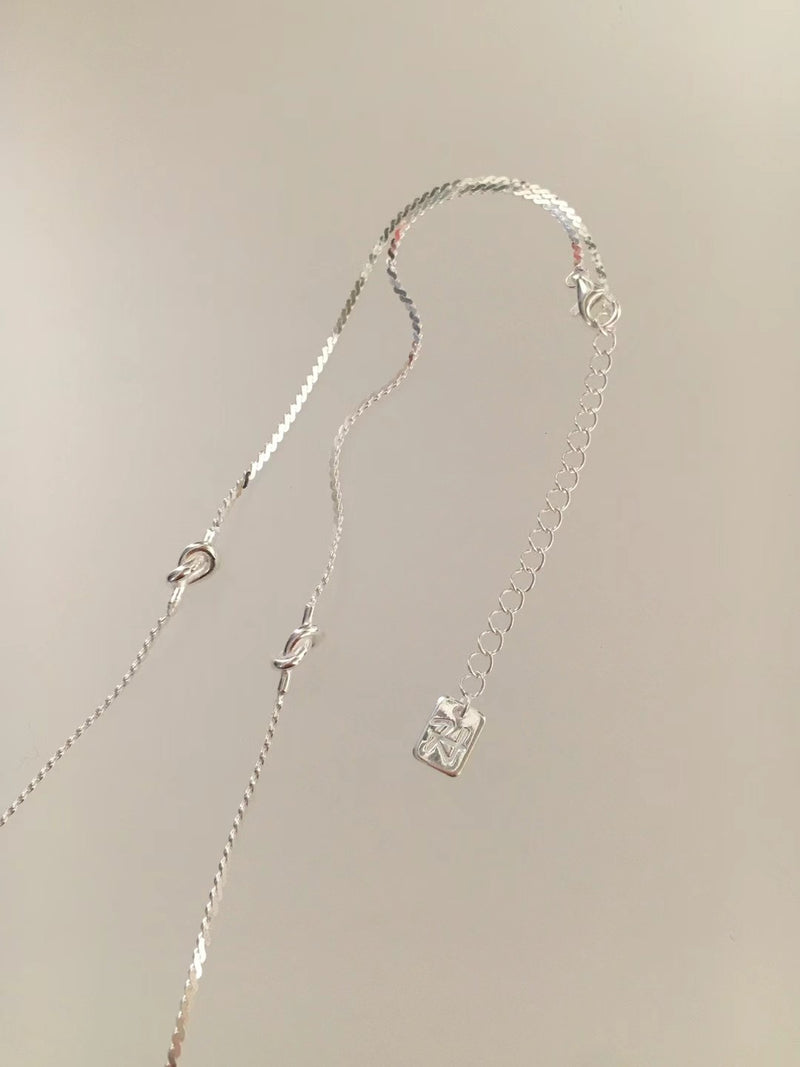 Premium silver necklace in minimal knots