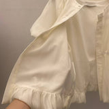 White smooth blouse in balloon shape