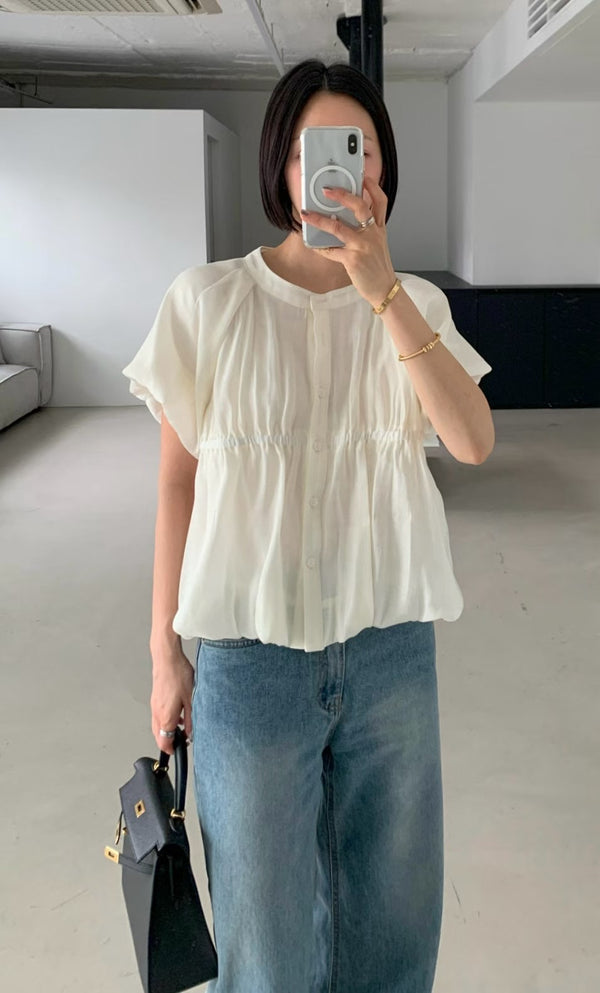 White smooth blouse in balloon shape