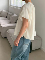 White smooth blouse in balloon shape