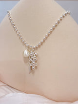 Chain necklace w/ ball and tessal pendant