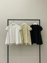 Yellow blouse in lace round neck