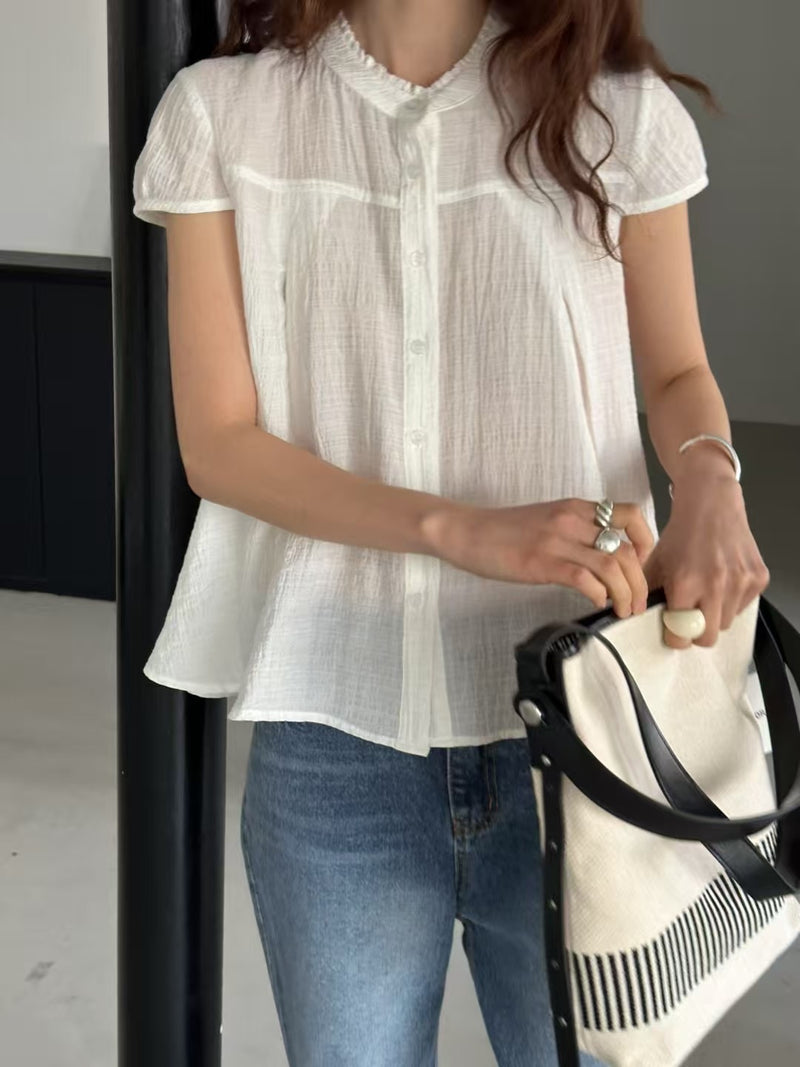 Yellow blouse in lace round neck