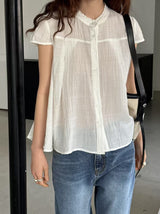 Yellow blouse in lace round neck