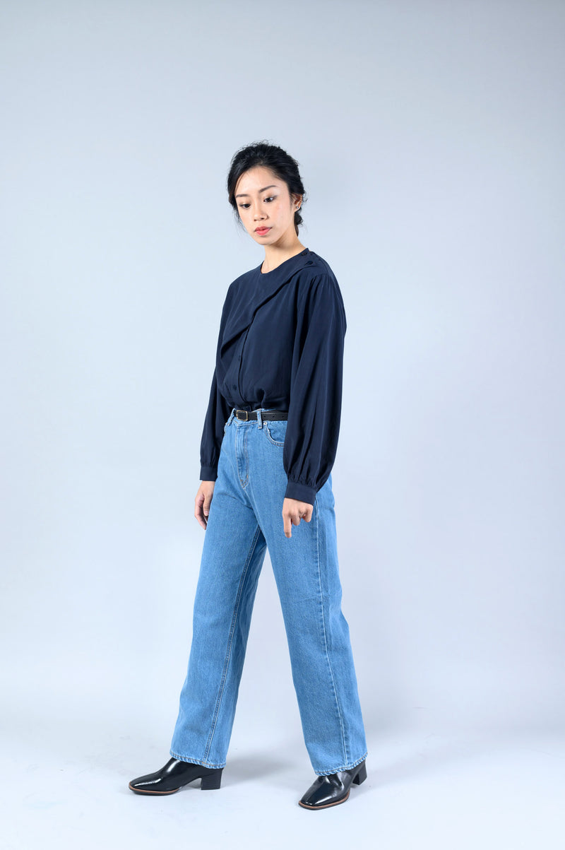 Navy blouse in asymmetric cut