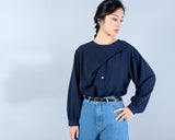 Navy blouse in asymmetric cut