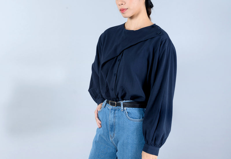 Navy blouse in asymmetric cut