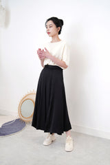 Black satin skirt in flare cut