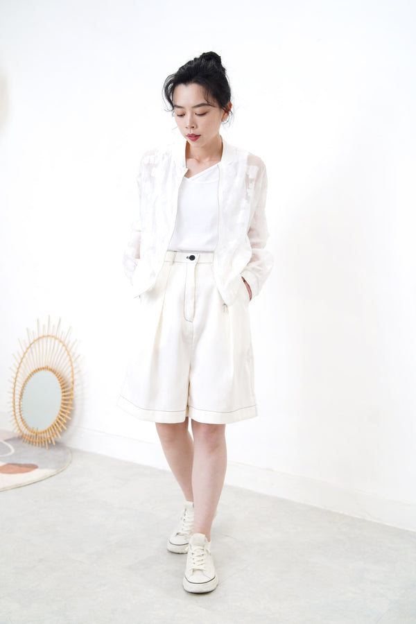 White bomber jacket in sheer floral pattern