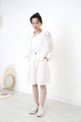 White bomber jacket in sheer floral pattern