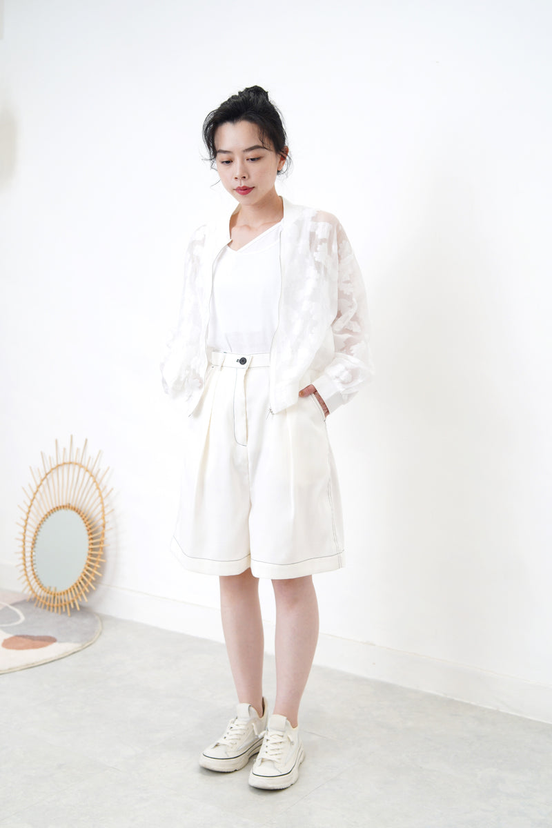 White bomber jacket in sheer floral pattern