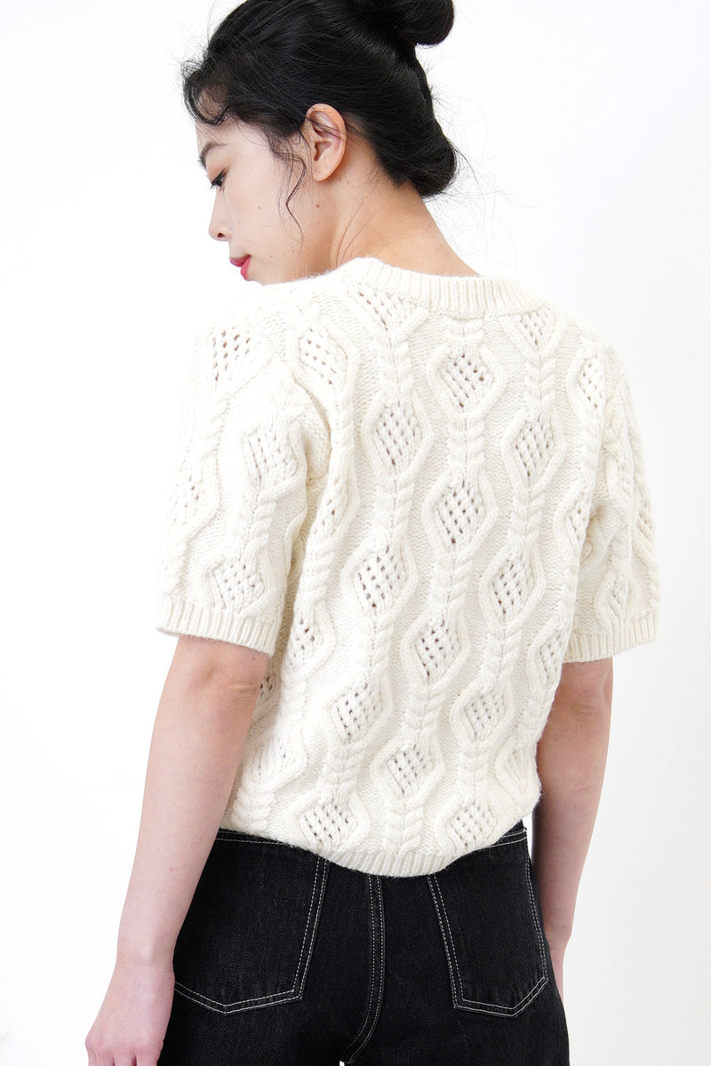 Cream knit top in 3D twist pattern