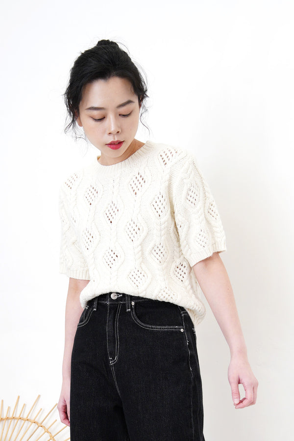 Cream knit top in 3D twist pattern