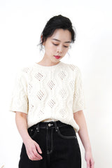 Cream knit top in 3D twist pattern