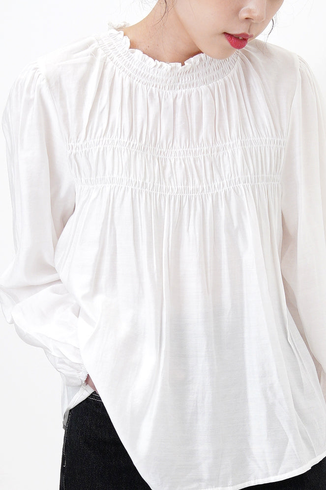 White soft dolly shirt in ruffle details