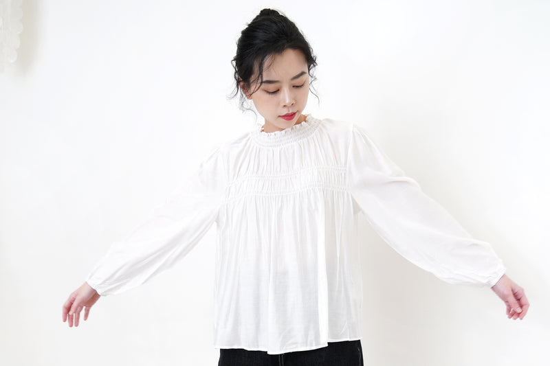 White soft dolly shirt in ruffle details
