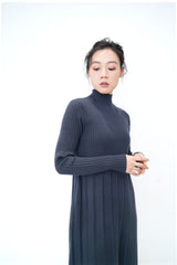 Charcoal knit dress in pleats
