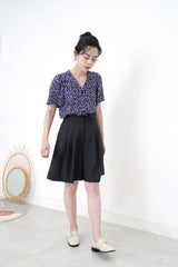 Navy floral blouse in frill sleeves