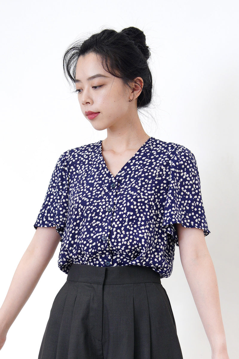 Navy floral blouse in frill sleeves
