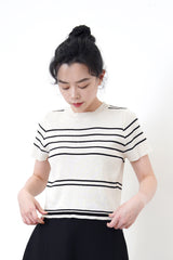 Beige knit top in stripes