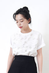 White top in sheer flower pattern