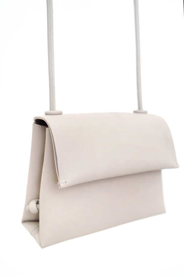 Grey leather cross body bag in thin strap