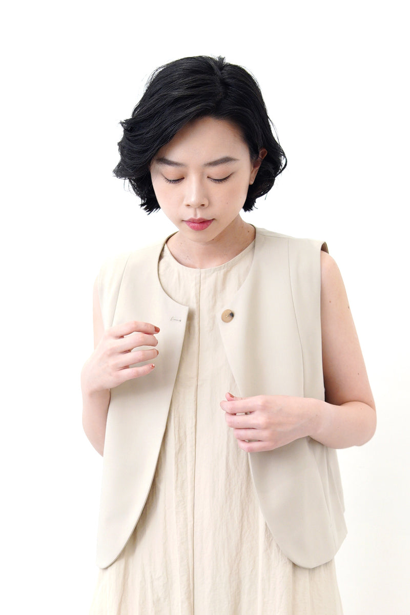 Beige premium vest jacket in round hem