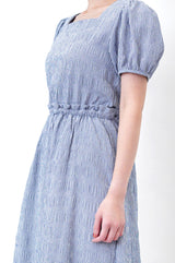 Blue checked dress in open back