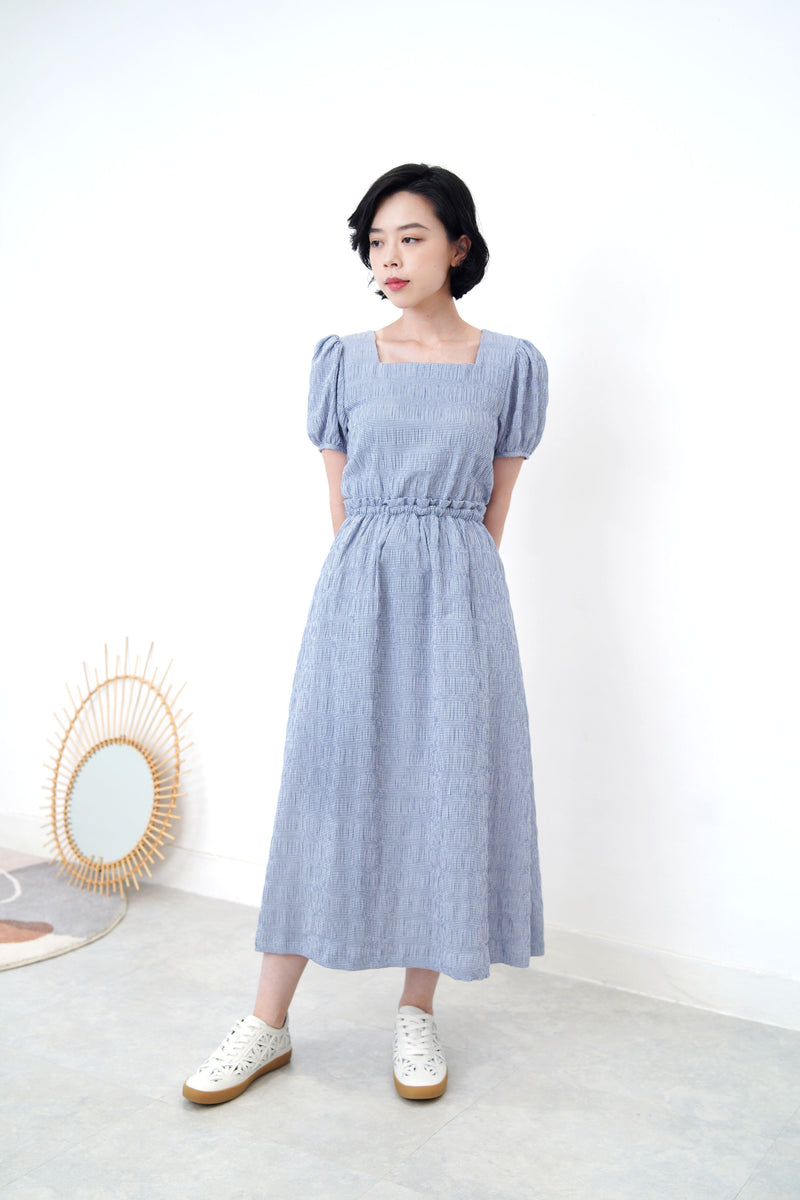 Blue checked dress in open back