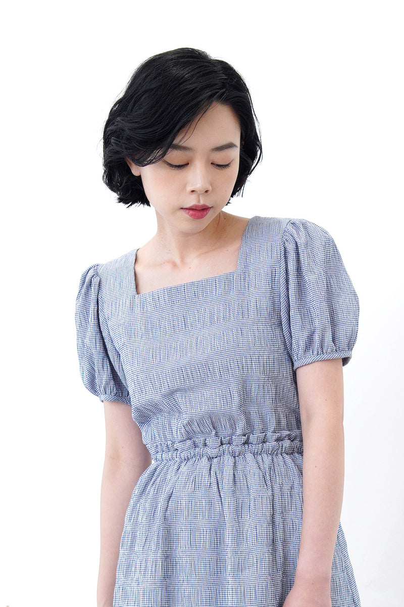 Blue checked dress in open back