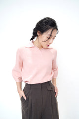 Pink knit polo top in 3D sleeves
