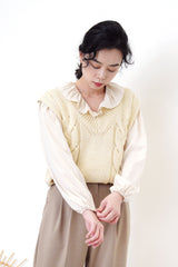 Ivory satin blouse in elastic peplum hem