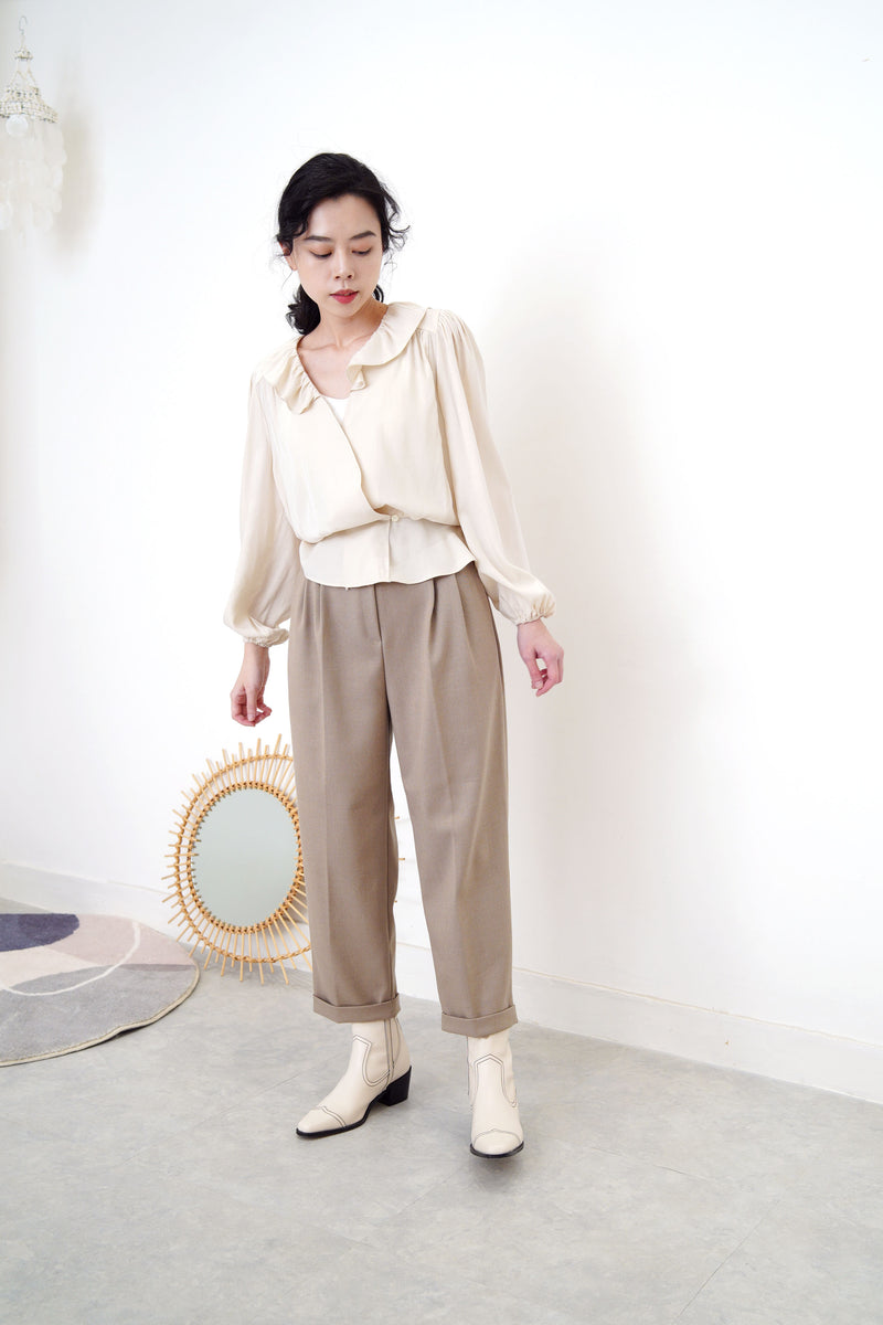 Ivory v neck knit vest in twist pattern