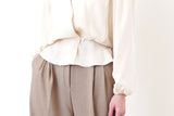 Ivory v neck knit vest in twist pattern