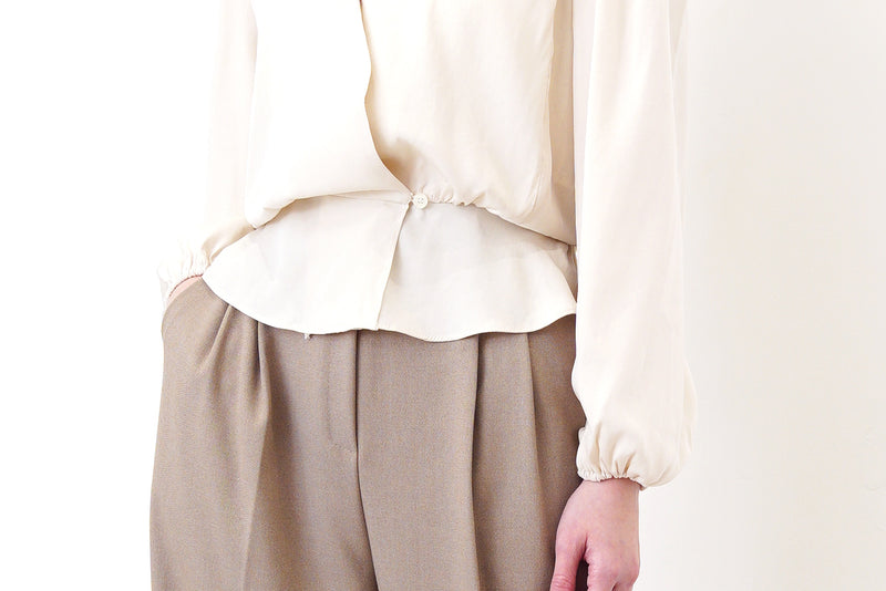 Ivory v neck knit vest in twist pattern