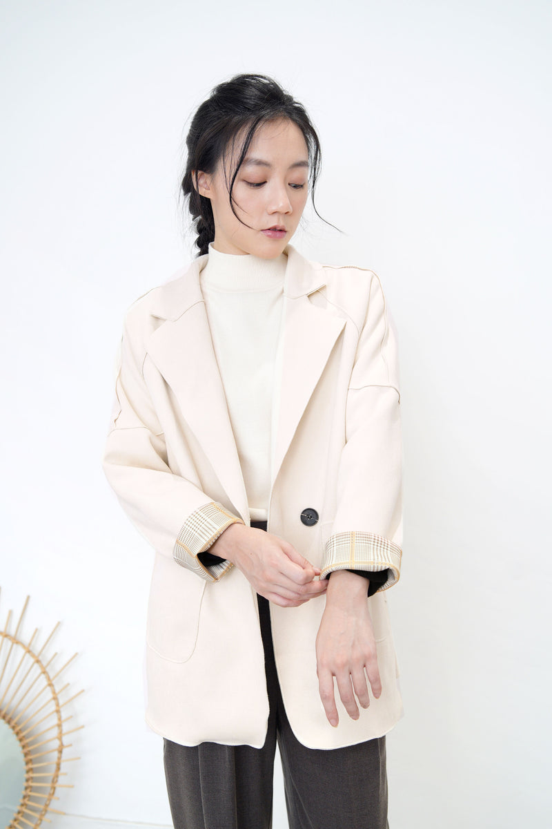 Cream blazer in brown checked cuff