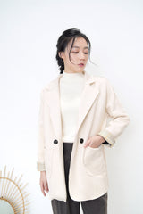 Cream blazer in brown checked cuff