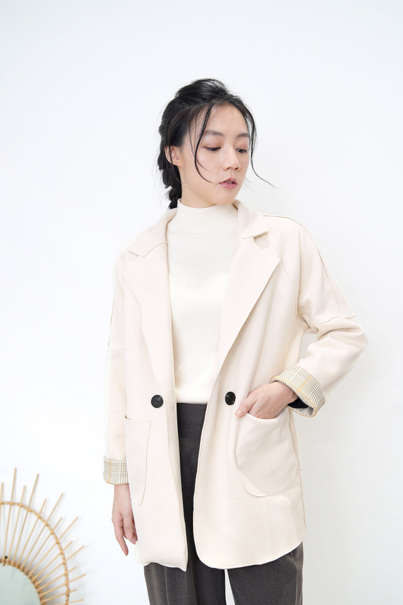 Cream blazer in brown checked cuff