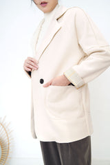 Cream blazer in brown checked cuff