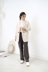 Cream blazer in brown checked cuff